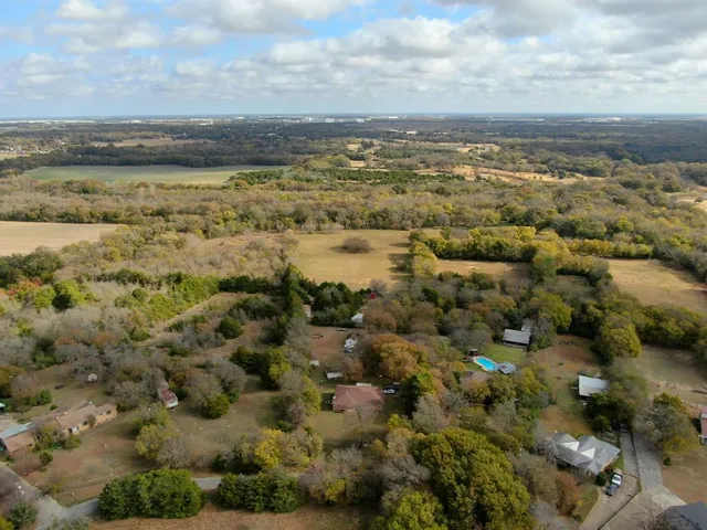 a view of outdoor space and a yard