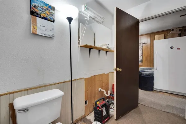 a bathroom with a sink and a toilet