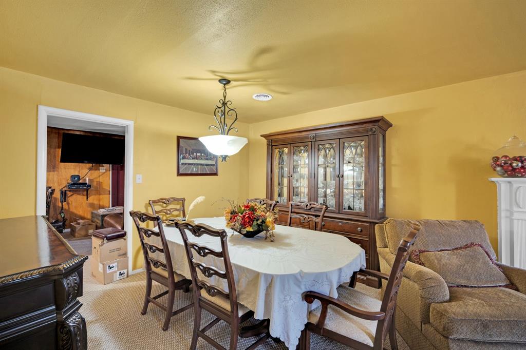846 Truman Circle Lancaster, TX 75146 - Photo 23 of 29 a view of a dining room with furniture and window
