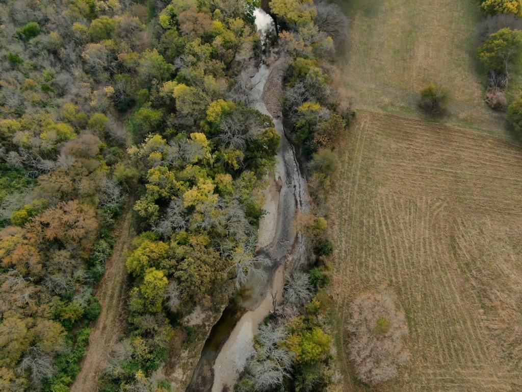 846 Truman Circle Lancaster, TX 75146 - Photo 27 of 29 a view of a forest with a house