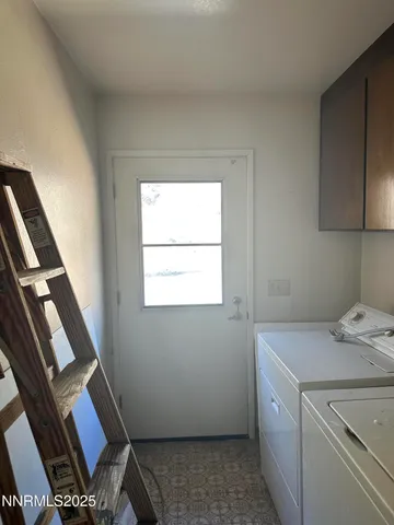 a bathroom with a toilet and a bathtub