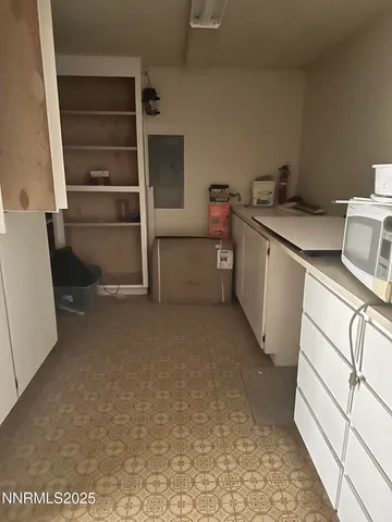 a storage room with washer and dryer