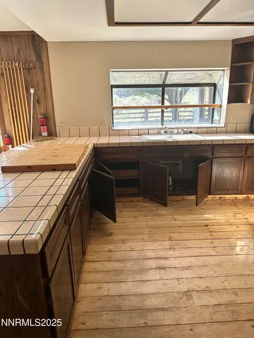 a room with a table and a window