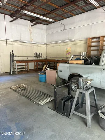 a view of a door of a house with a street