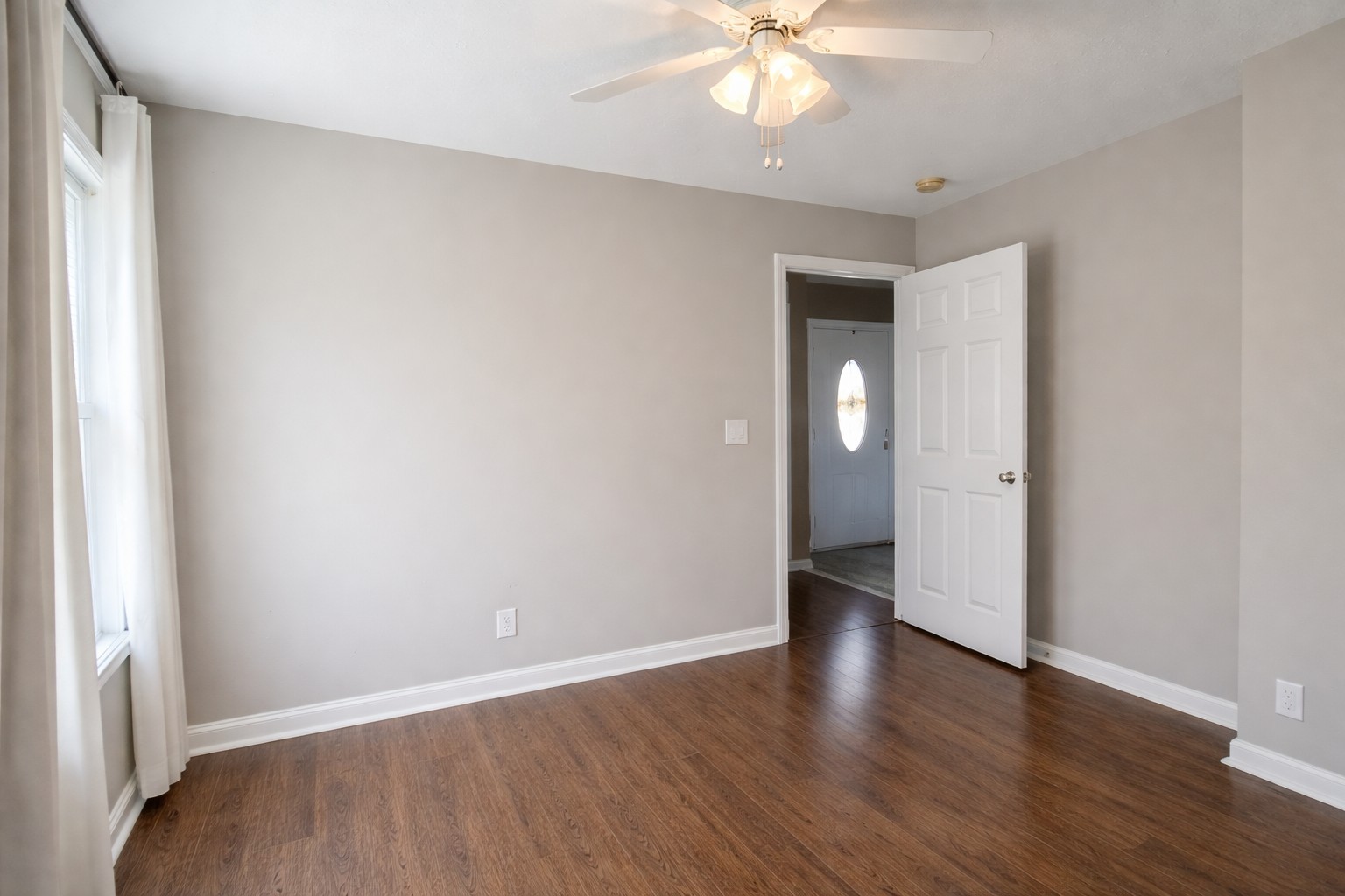 1809 Abrams Road Clarksville, TN 37042 - Photo 27 of 43 an empty room with wooden floor and closet