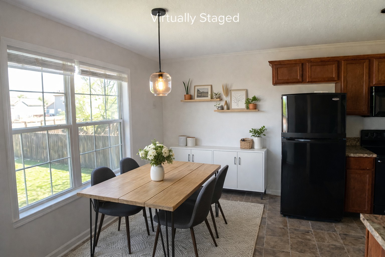 1809 Abrams Road Clarksville, TN 37042 - Photo 10 of 43 a kitchen with a table and refrigerator