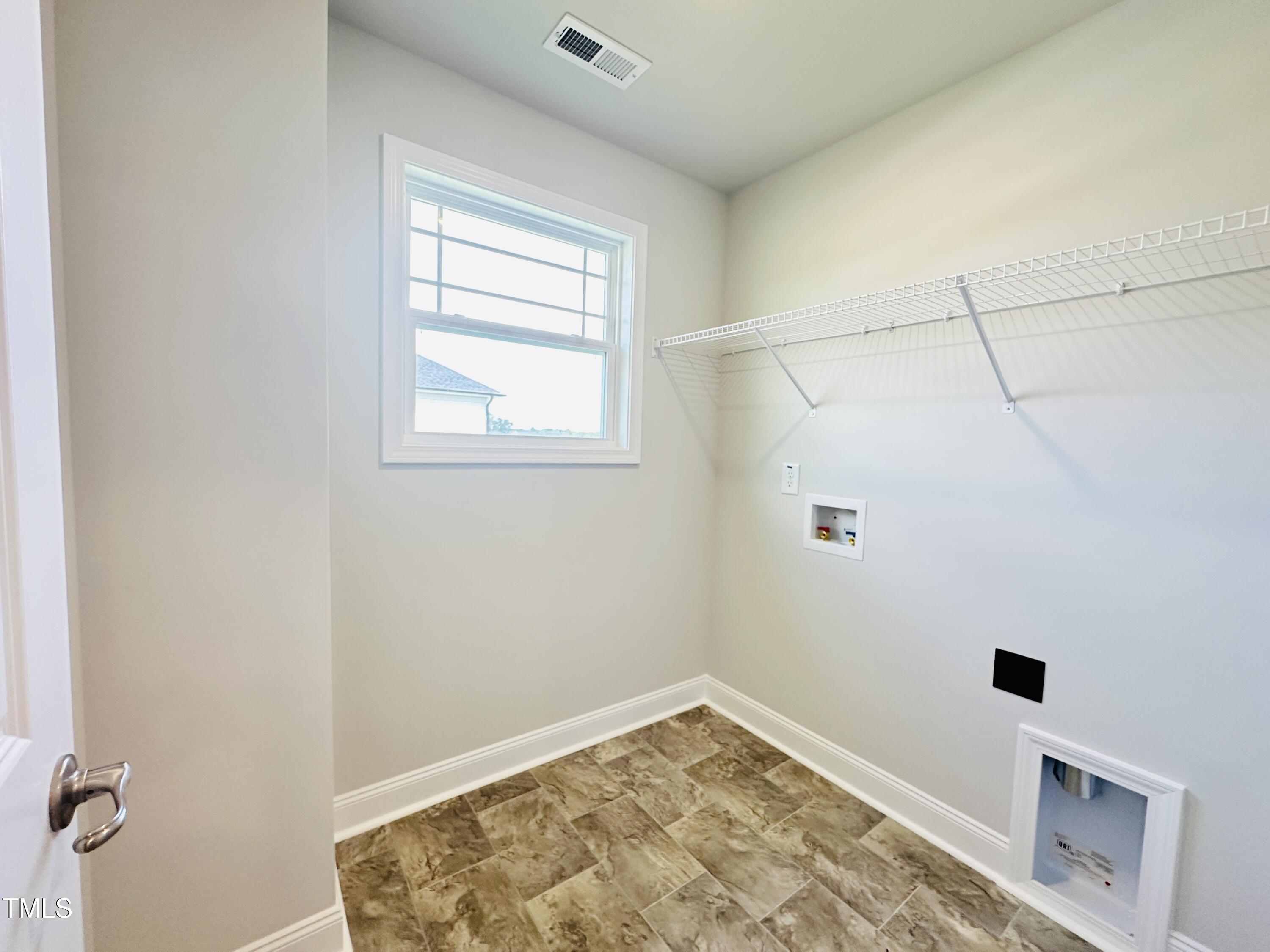 3982 Fletcher Road Bailey, NC 27807 - Photo 14 of 28 a view of an empty room with a window