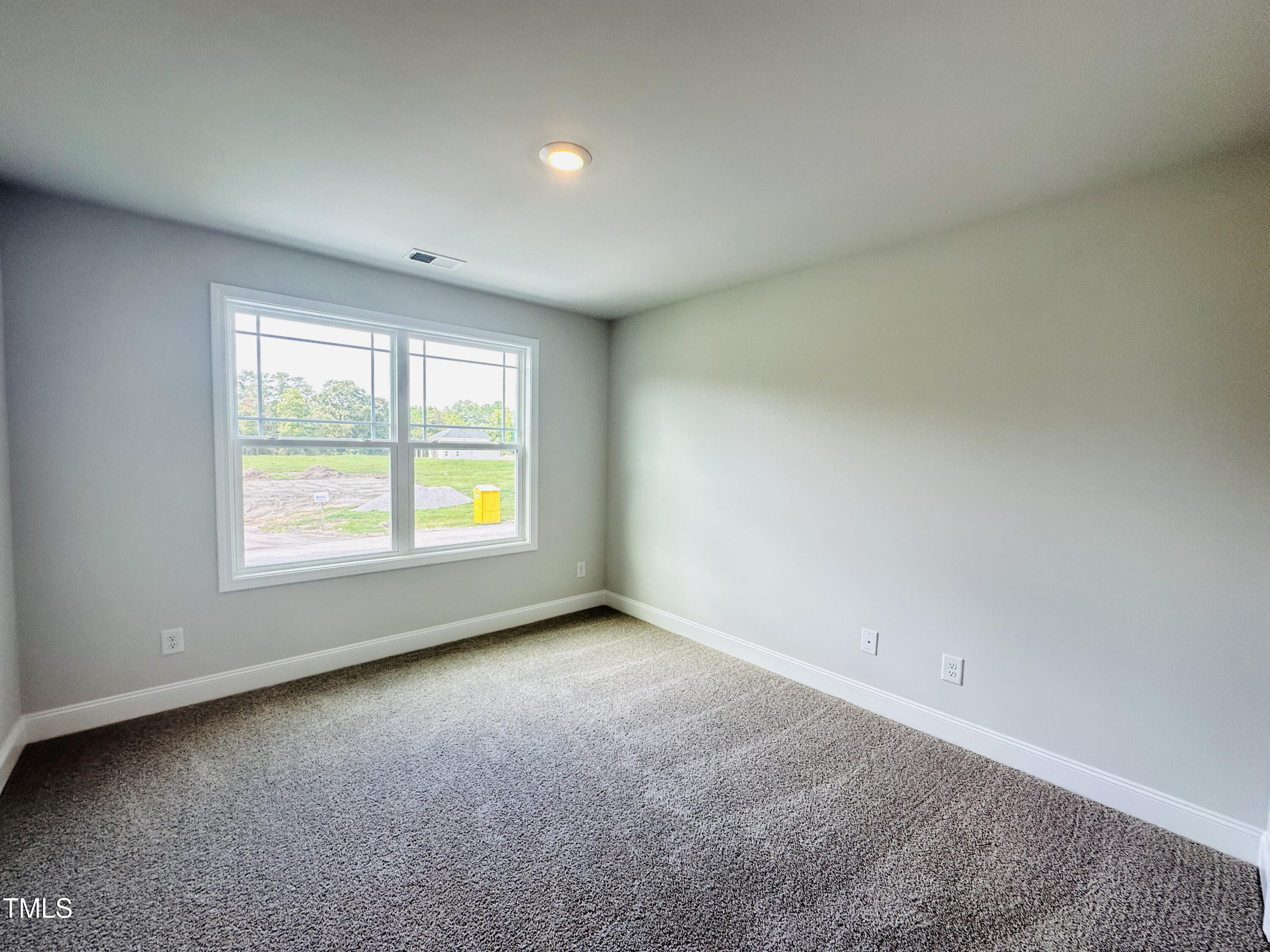 3982 Fletcher Road Bailey, NC 27807 - Photo 15 of 28 an empty room with windows