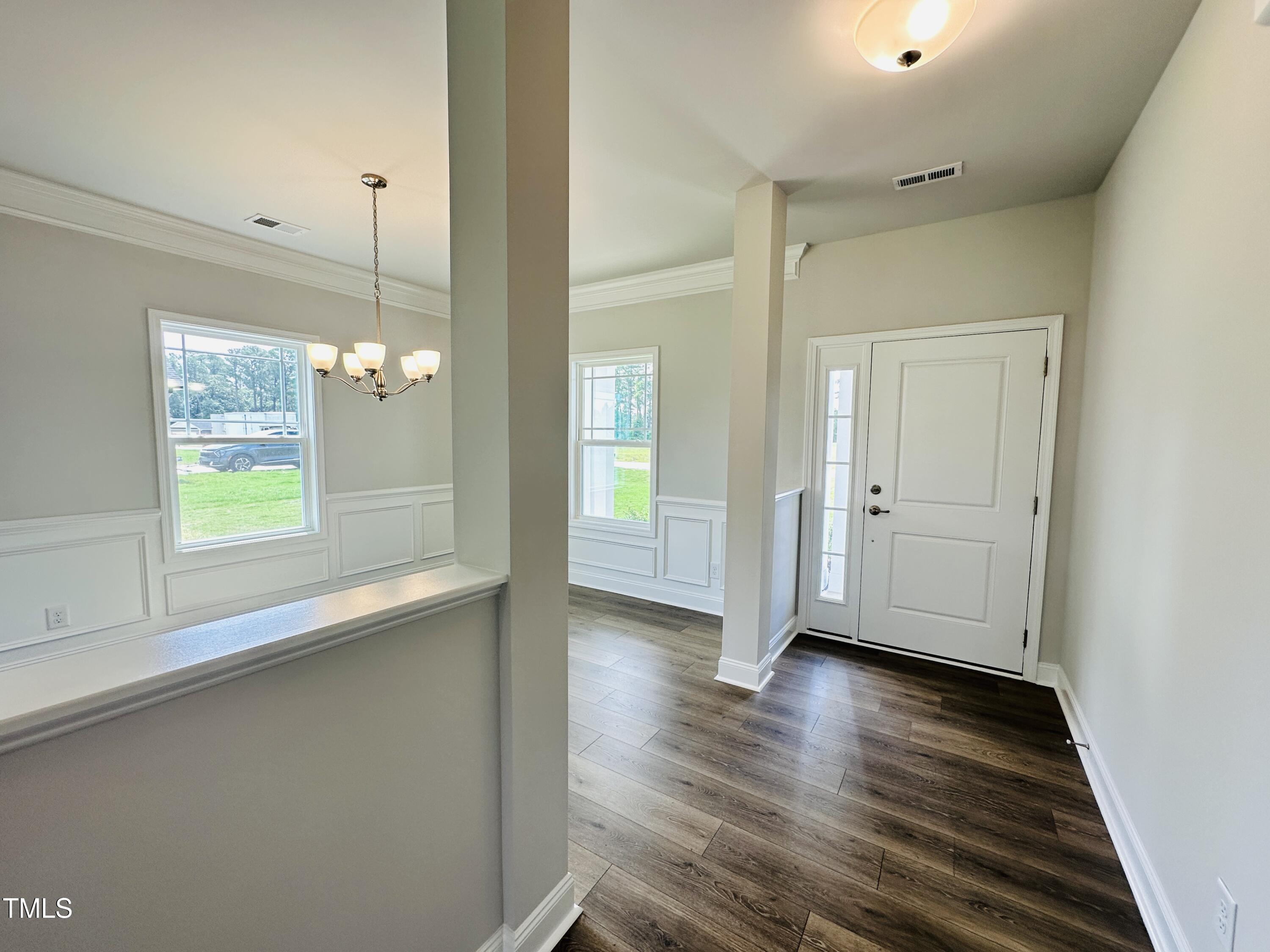 3982 Fletcher Road Bailey, NC 27807 - Photo 2 of 28 a view of a room with wooden floor and window