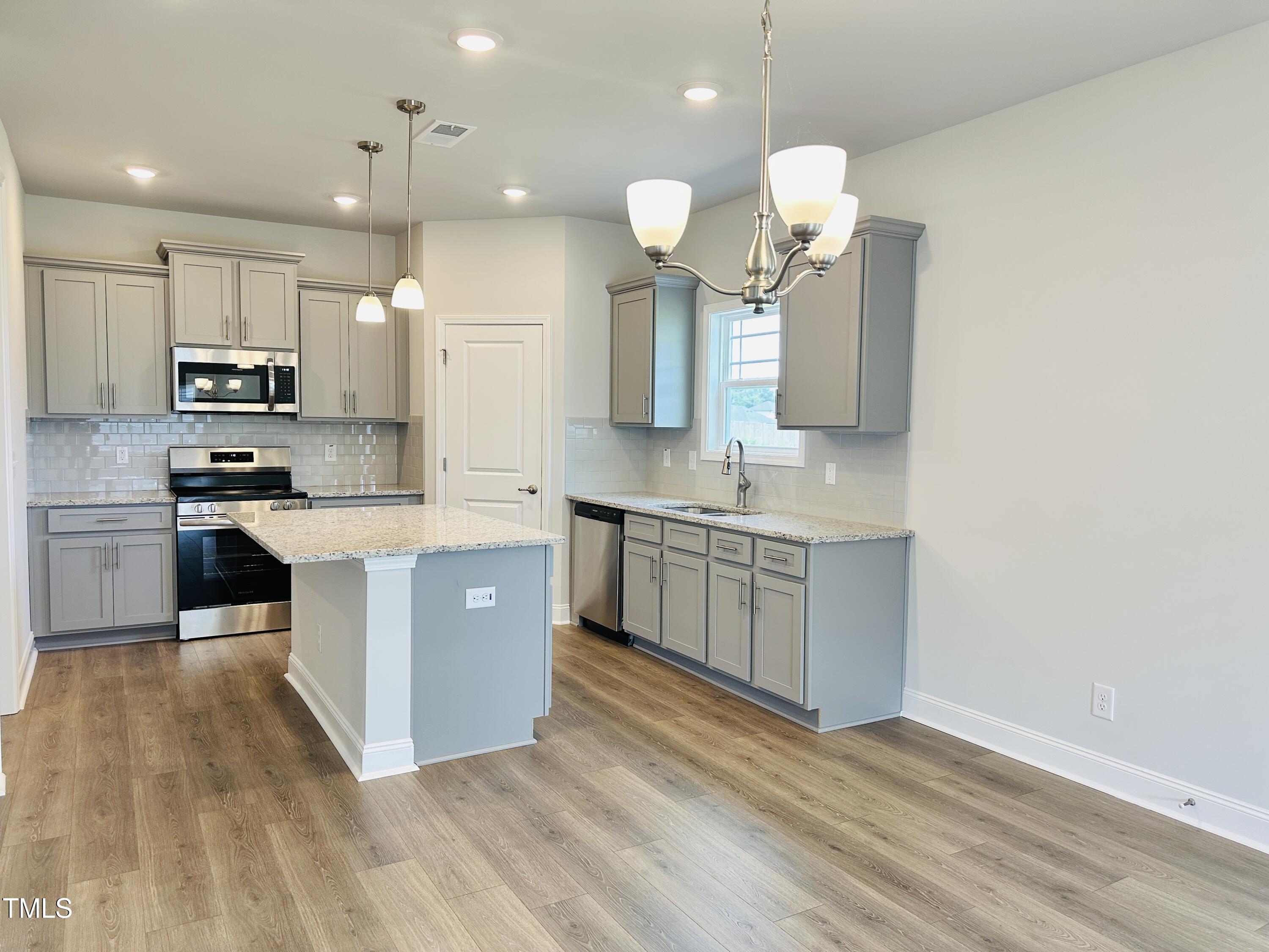 3982 Fletcher Road Bailey, NC 27807 - Photo 5 of 28 a large kitchen with a lot of counter space
