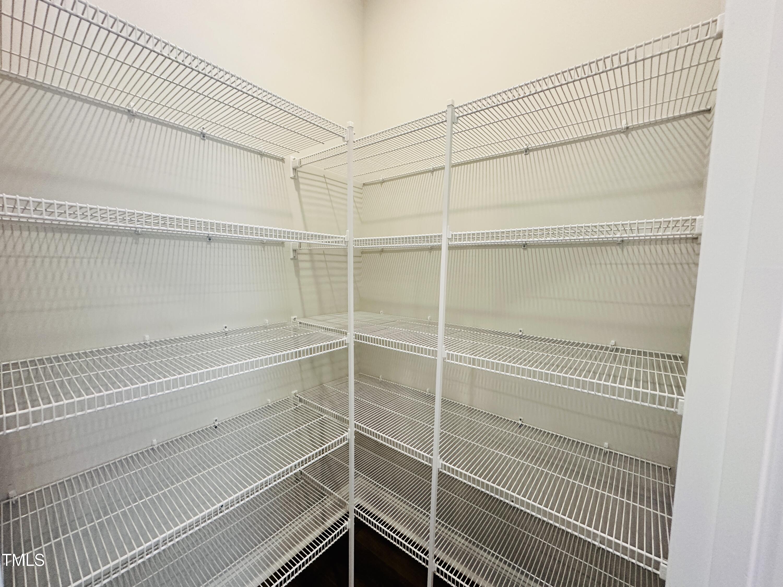 3982 Fletcher Road Bailey, NC 27807 - Photo 8 of 28 a view of a room with empty racks