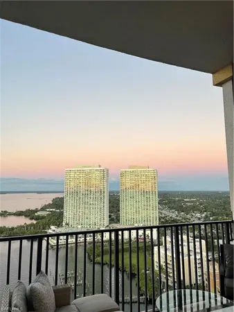 a view of city with ocean