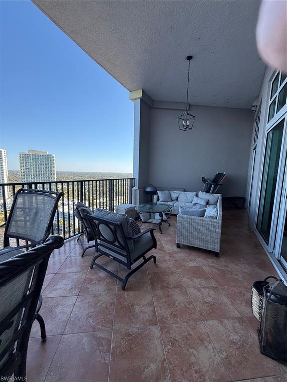 2797 First Street, Unit 2105 Fort Myers, FL 33916 - Photo 15 of 18 Balcony with an outdoor hangout area