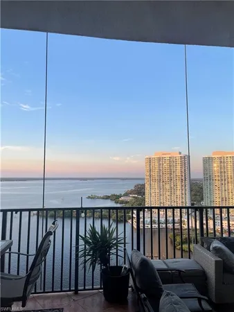 a view of balcony with furniture