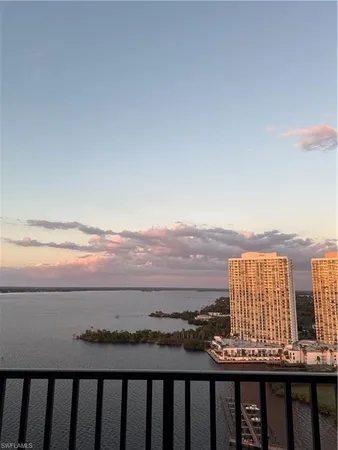 a view of city with ocean