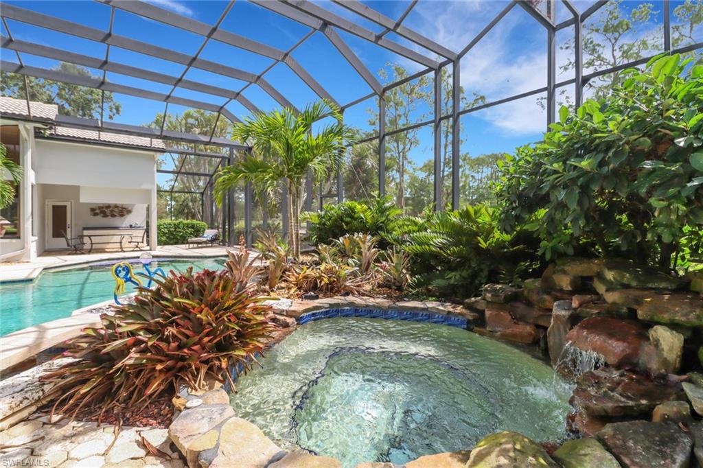 12902 Valewood Drive Naples, FL 34119 - Photo 20 of 22 a view of a backyard with plants