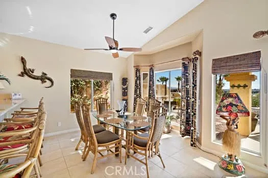 a kitchen with stainless steel appliances granite countertop a stove and more cabinets