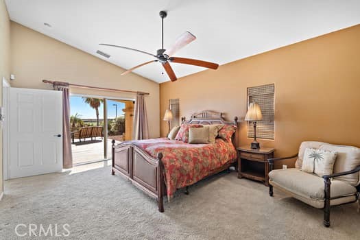 2710 Colorado River Road Blythe, CA 92225 - Photo 19 of 38 a bedroom with a bed couch and window