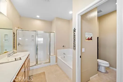 a bedroom with bed and a window