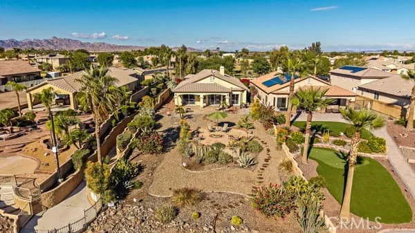 a view of a lake with couches and city view