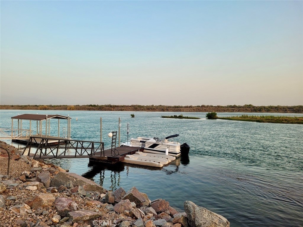 2710 Colorado River Road Blythe, CA 92225 - Photo 4 of 38 a view of a lake with couches and city view