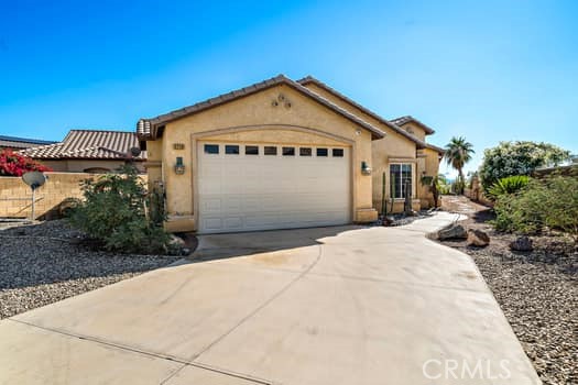 2710 Colorado River Road Blythe, CA 92225 - Photo 6 of 38 a front view of a house with a yard
