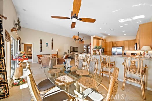 2710 Colorado River Road Blythe, CA 92225 - Photo 10 of 38 a living room with lots of white furniture and a view of kitchen