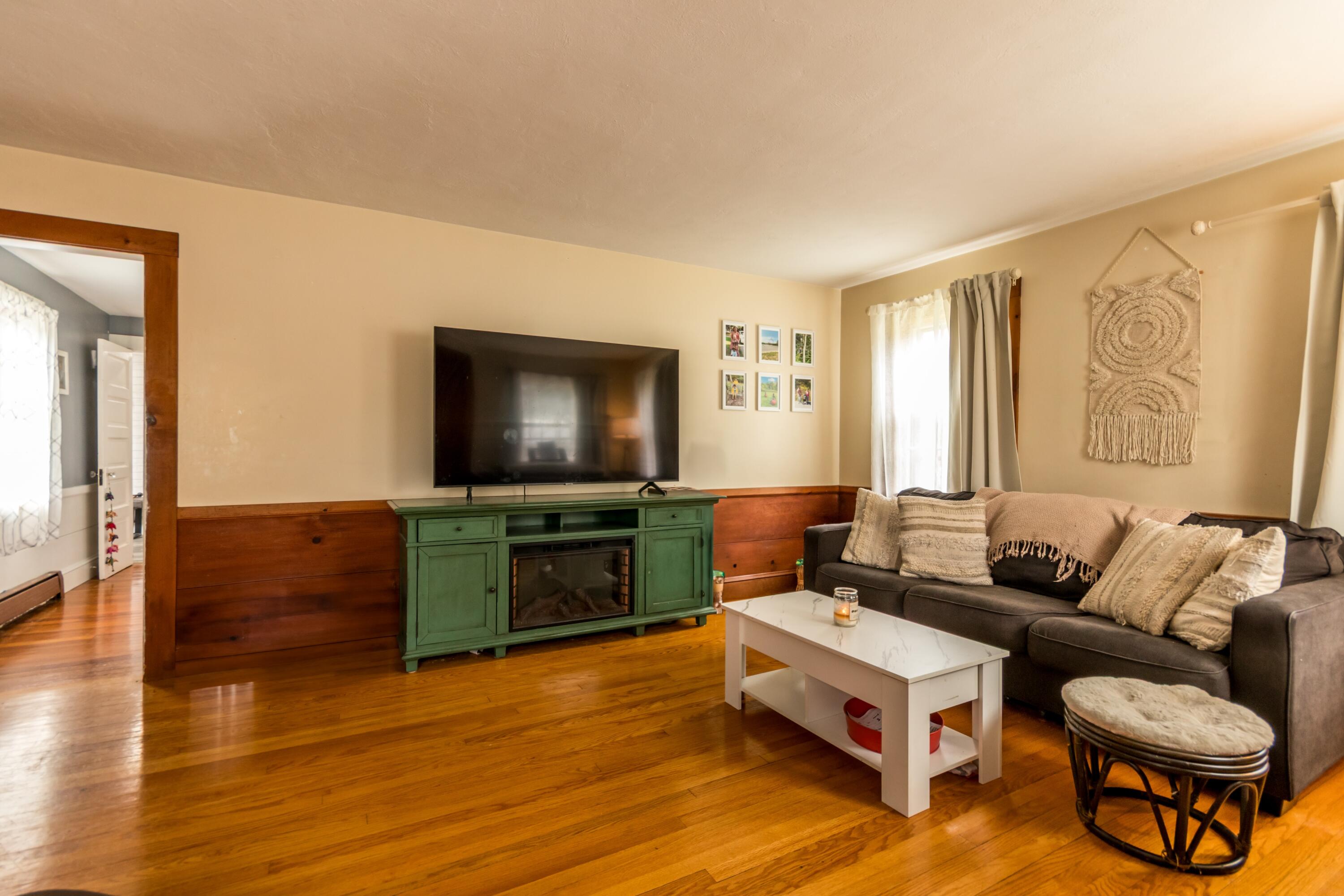 1003 Point Road Marion, MA 02738 - Photo 6 of 30 a living room with furniture and a flat screen tv