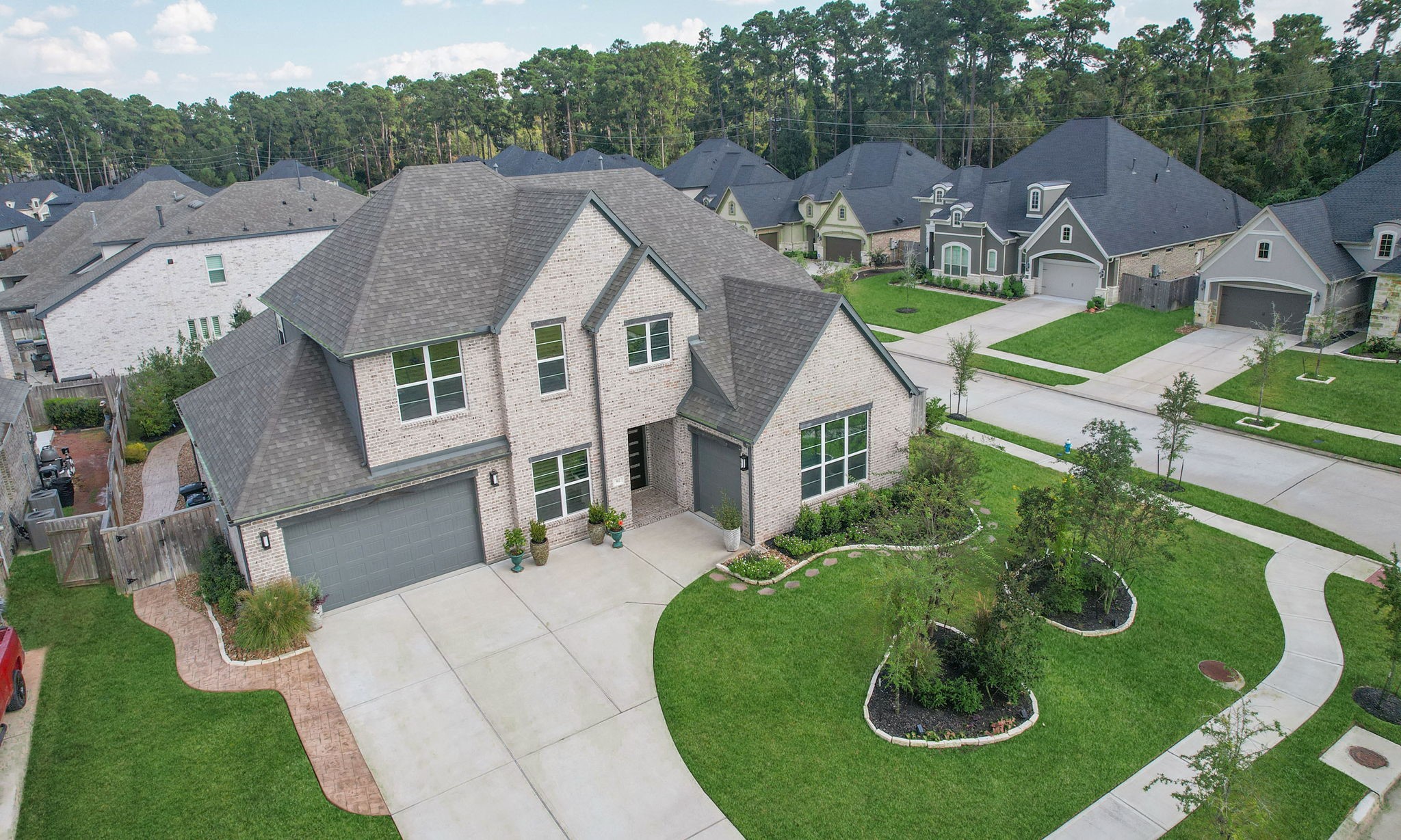 an aerial view of a house with garden