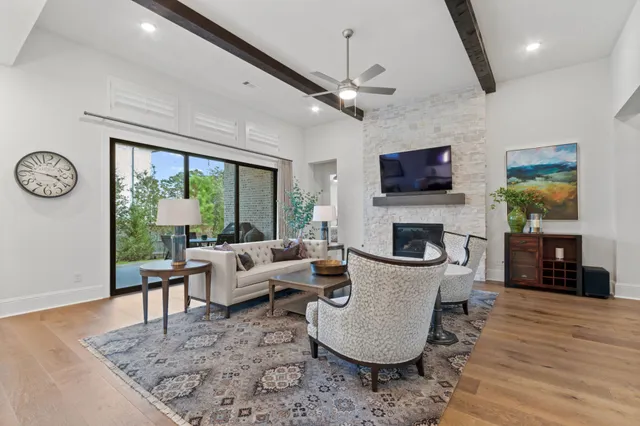a living room with furniture a chandelier