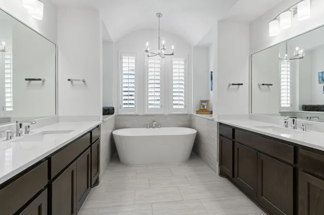 a view of a patio with a table and chairs
