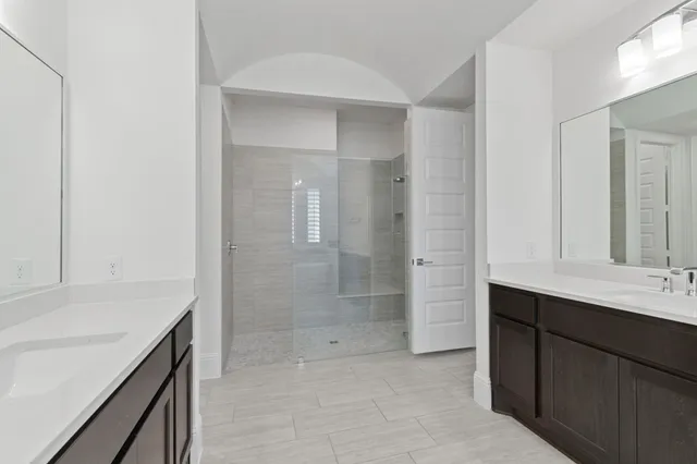 a dining room with furniture and windows