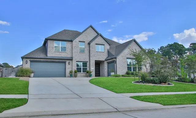 a view of a house with a potted plant and a potted plant
