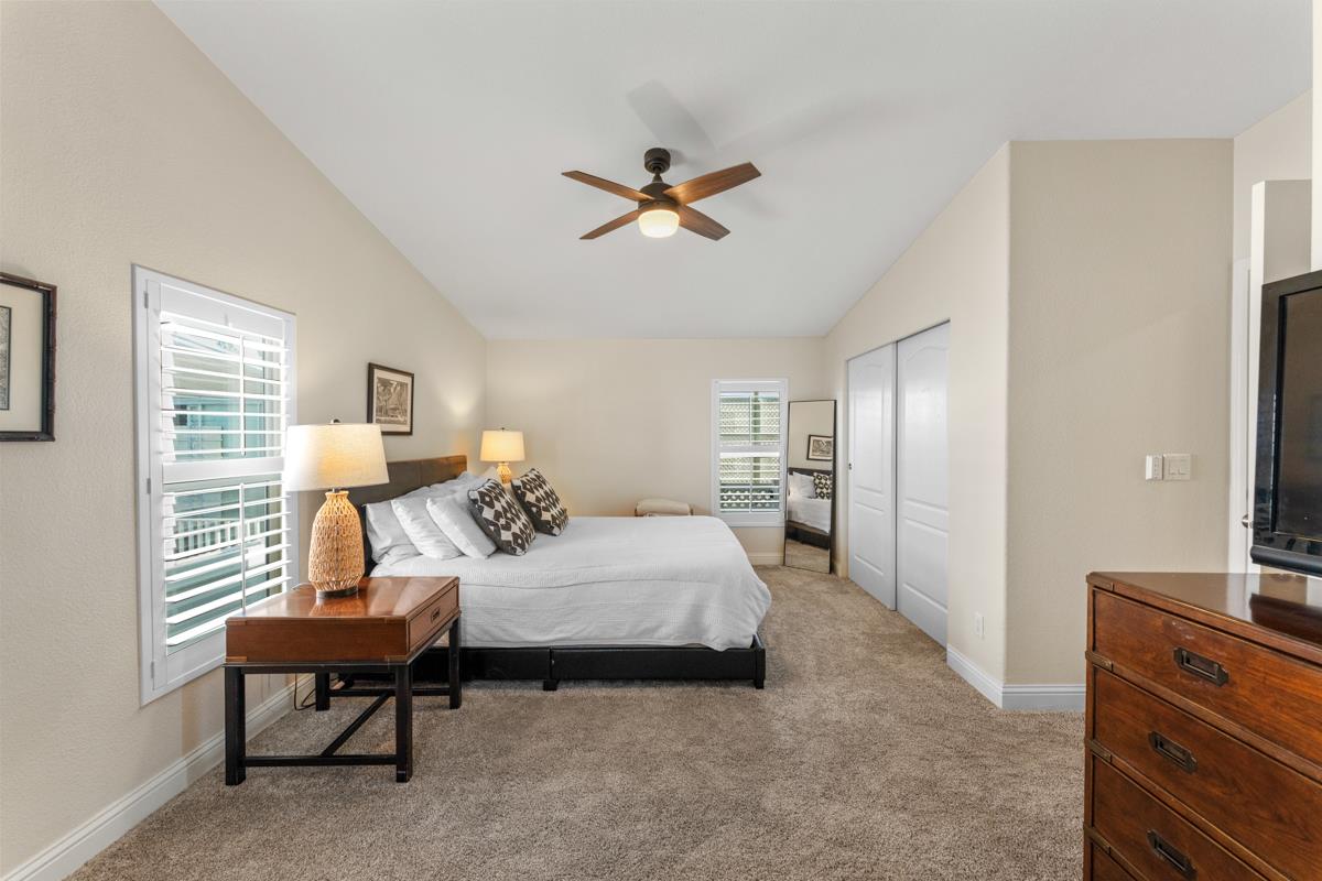 128 Don Felipe Ojai, CA 93023 - Photo 16 of 35 a bedroom with furniture and a chandelier