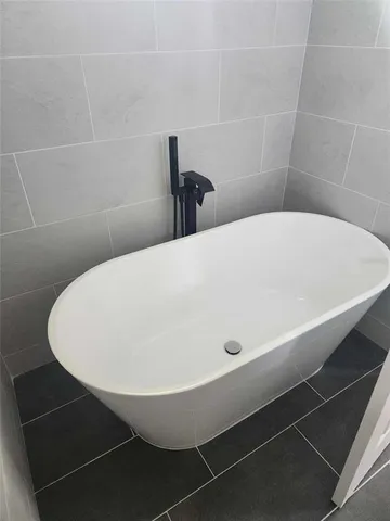 a bathroom with a bathtub
