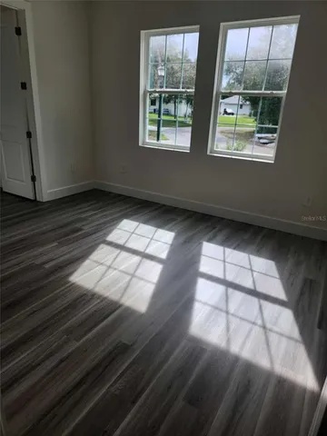 a view of an empty room and window