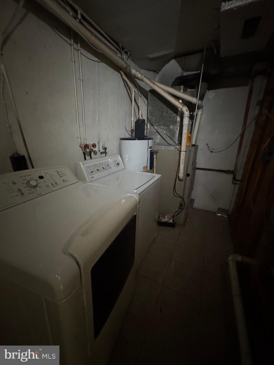 2705 Round Road Baltimore, MD 21225 - Photo 9 of 10 a utility room with dryer and washer