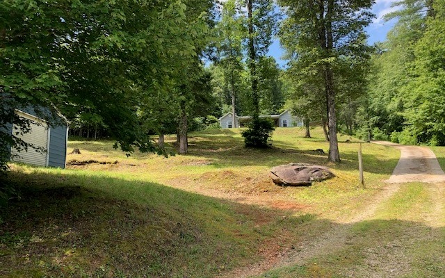 375 Rough Gravel Road Murphy, NC 28906 - Photo 1 of 1 a view of a backyard with swimming pool