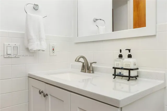 a view of hallway with washer and dryer