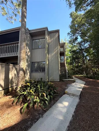 a view of a back yard of the house