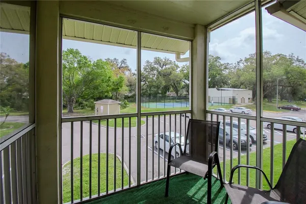 a view of a two chair in the balcony