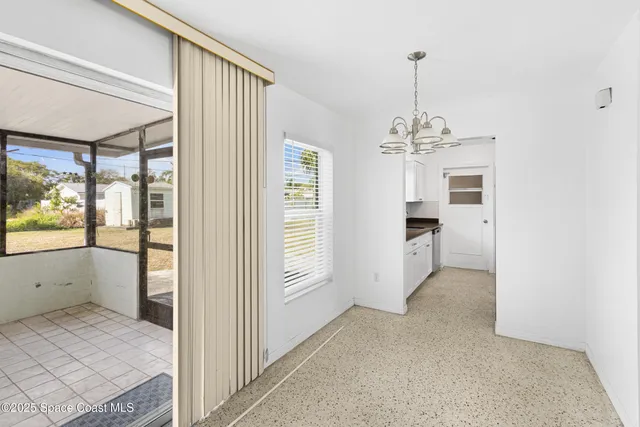 a view of a livingroom with a chandelier