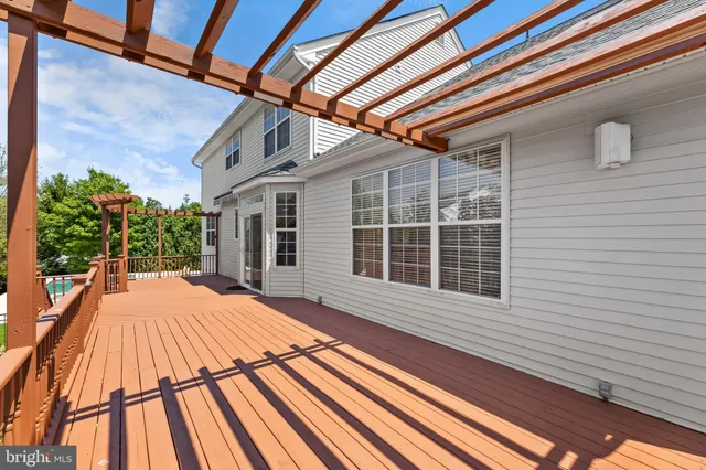 a view of a house with a big yard and a big yard