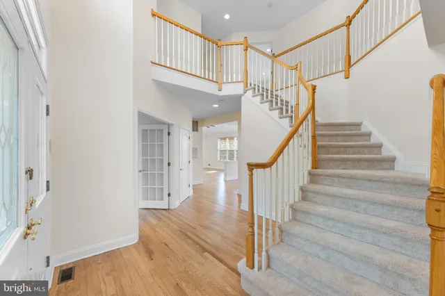 a view of entryway with wooden floor