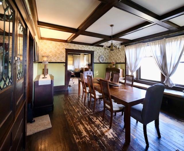 441 Main Street Rimersburg, PA 16248 - Photo 11 of 28 a dining room with wooden floor a chandelier a glass table and chairs