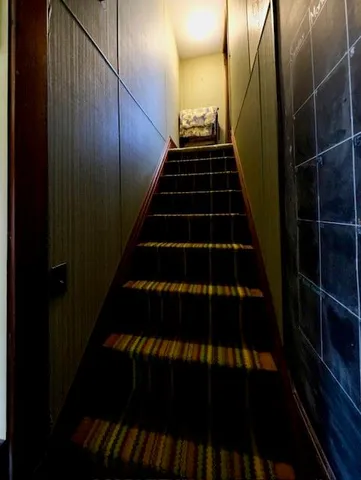 a view of balcony with wooden floor