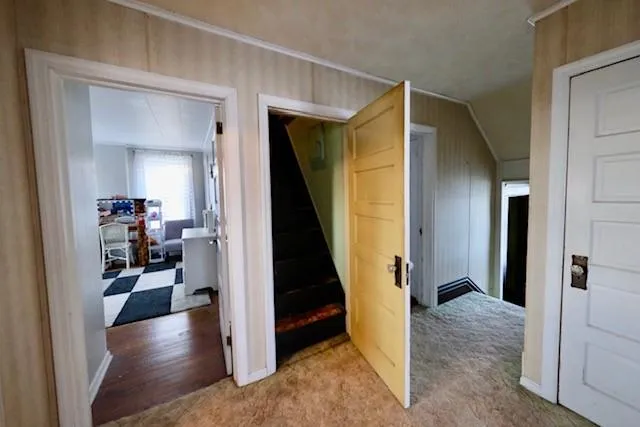 a view of a livingroom from a hallway