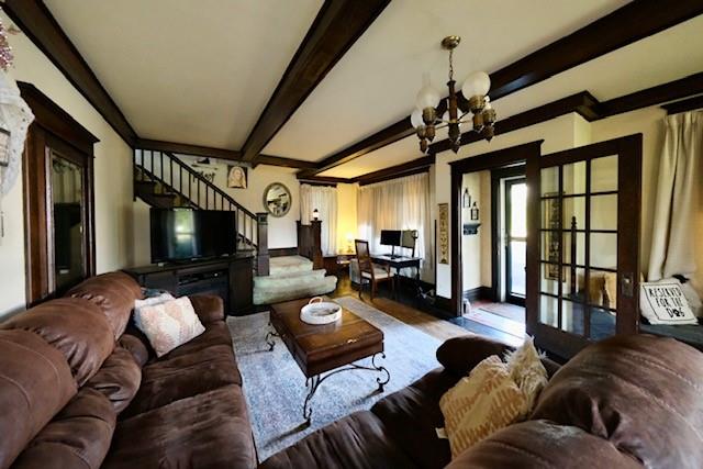 441 Main Street Rimersburg, PA 16248 - Photo 8 of 28 a living room with furniture a flat screen tv and a floor to ceiling window