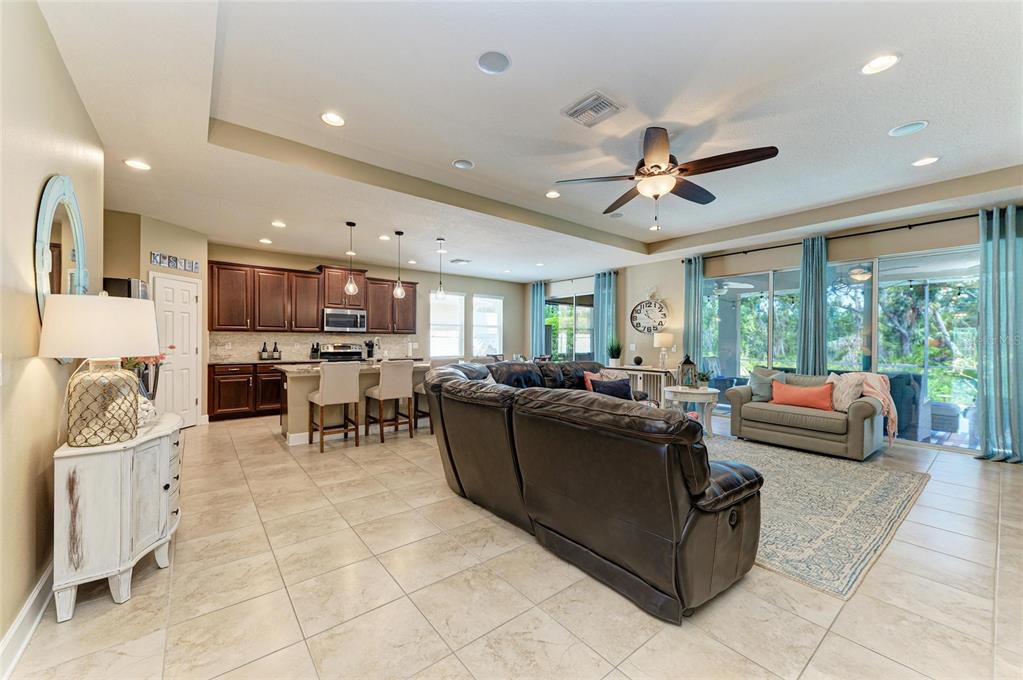 5307 65th Terrace East Ellenton, FL 34222 - Photo 13 of 47 a living room with furniture and a large window