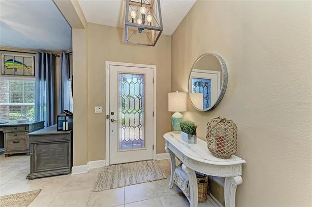 a room with furniture and a mirror